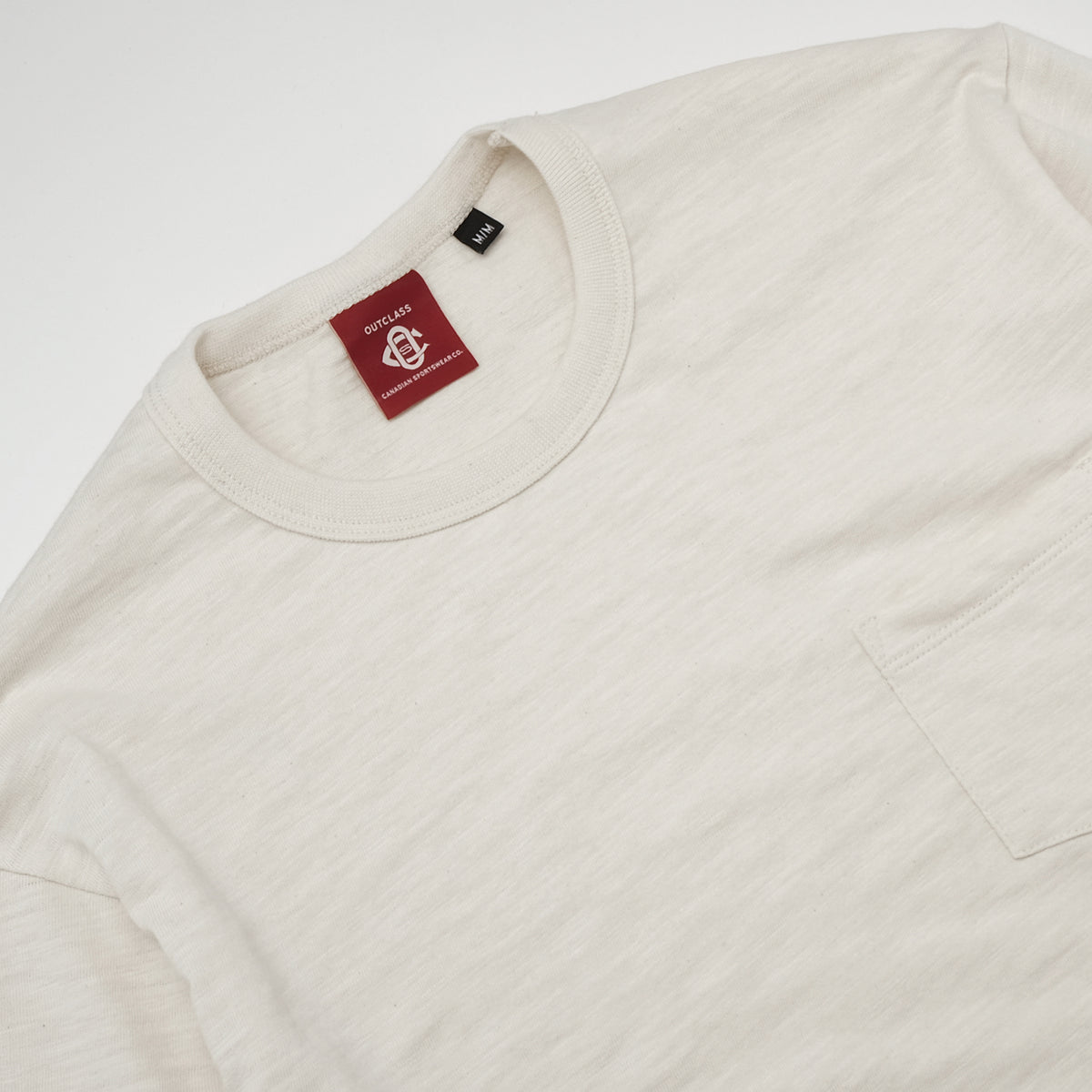 Ecru crew-neck long-sleeve T-shirt with chest pocket and neck tag
