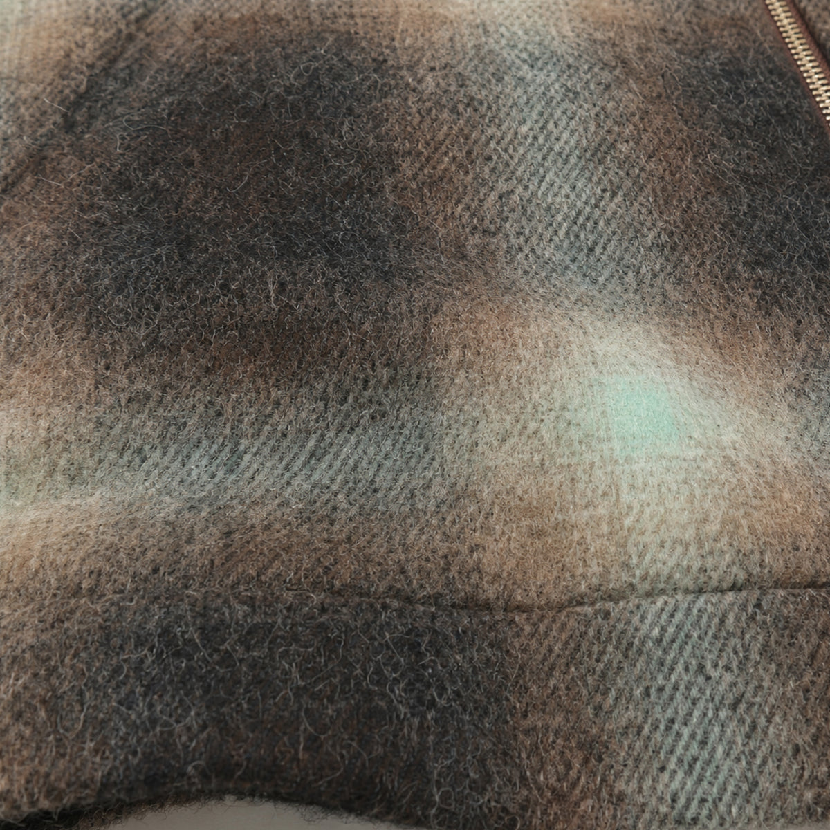 Plaid wool harrington jacket fabric close-up with soft textured weave