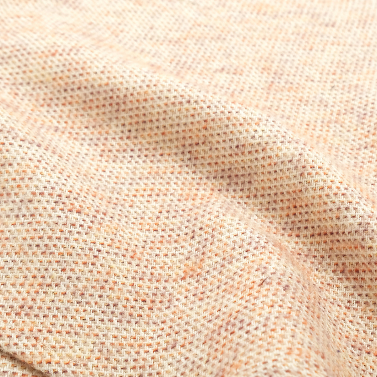 Ecru tweed flannel fabric close-up with fine textured weave