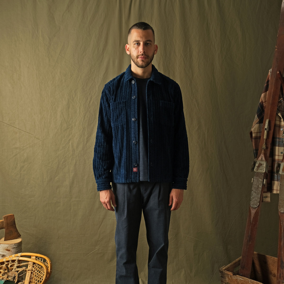 Dark navy corduroy club shirt with button front, spread collar, long sleeves
