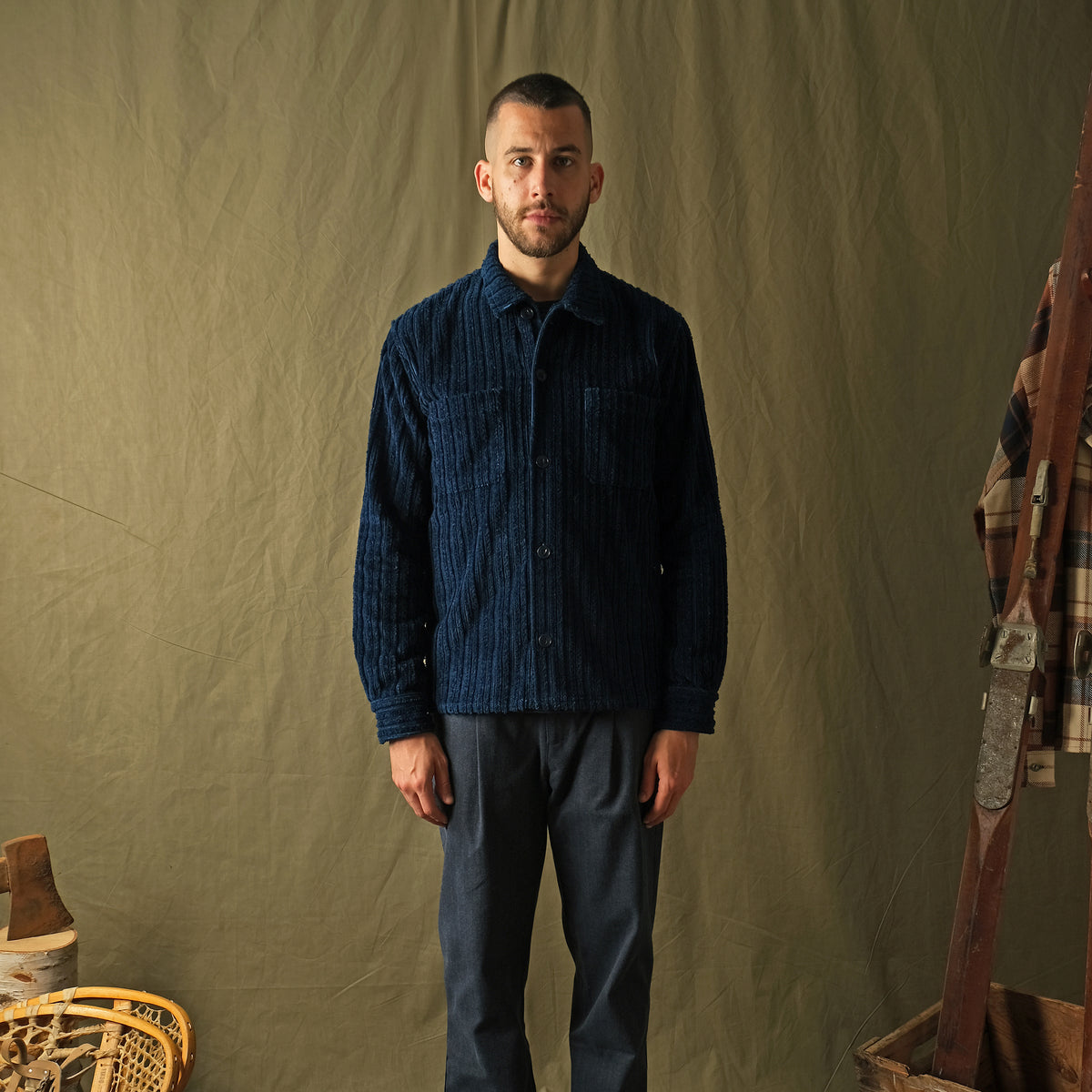 Dark navy corduroy club shirt with button front and two chest pockets