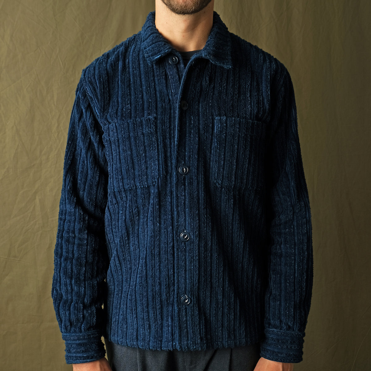 Dark navy jumbo corduroy club shirt with buttoned placket and chest patch pockets