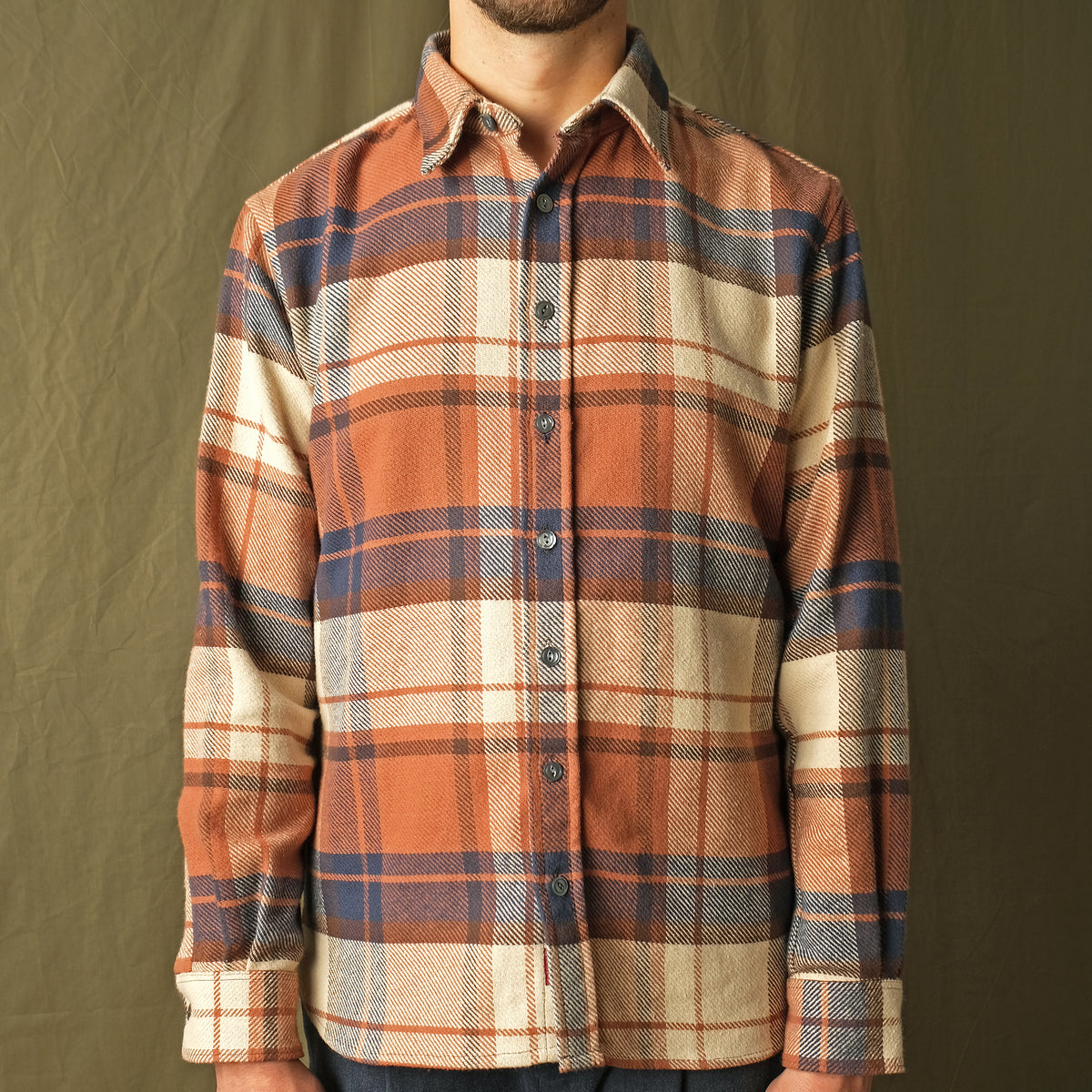 Men's plaid flannel easy shirt with button front and chest pocket, orange and navy