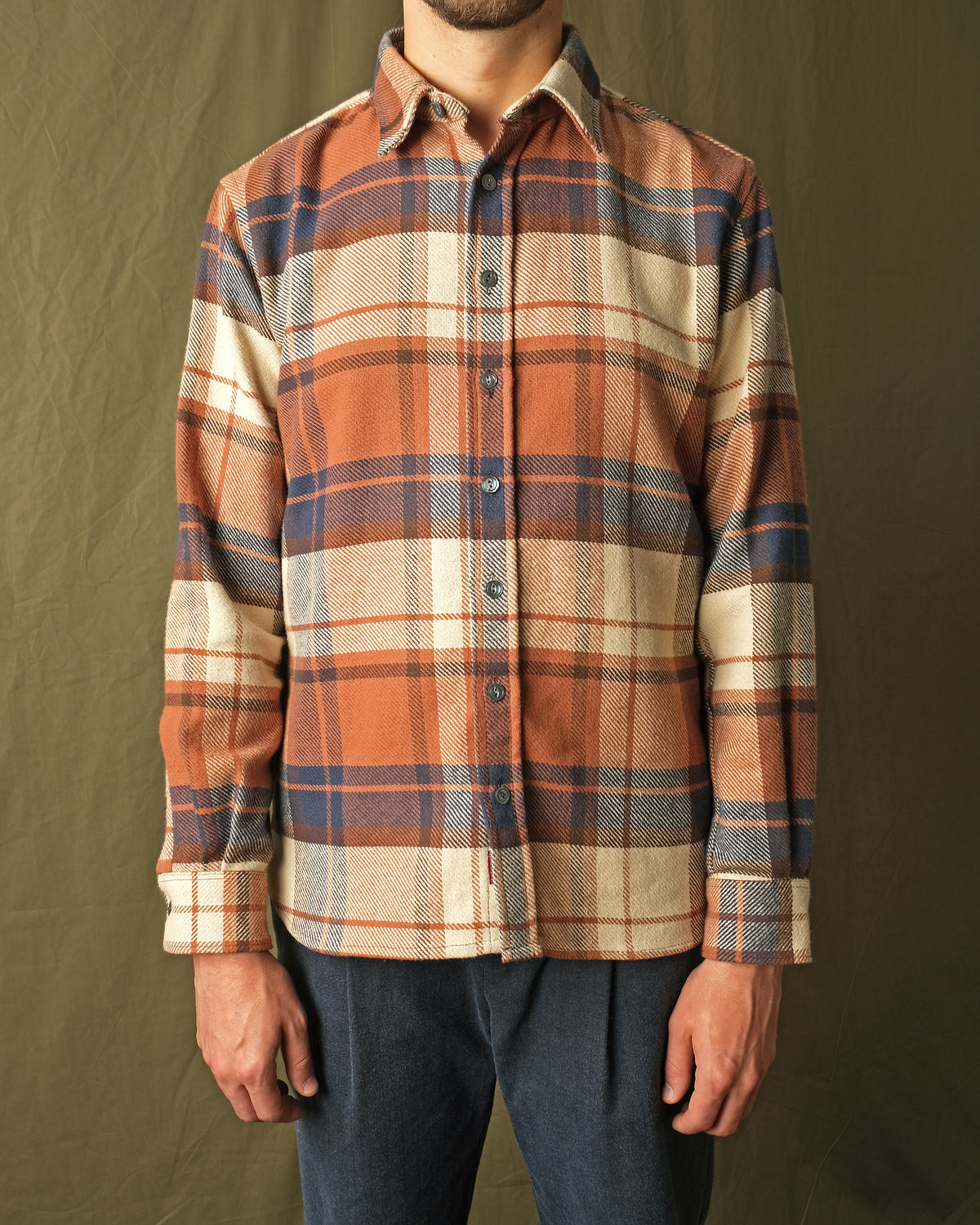 Men's plaid flannel easy shirt with button front and chest pocket, orange and navy