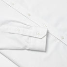 White twill dress shirt buttoned cuff and sleeve placket detail