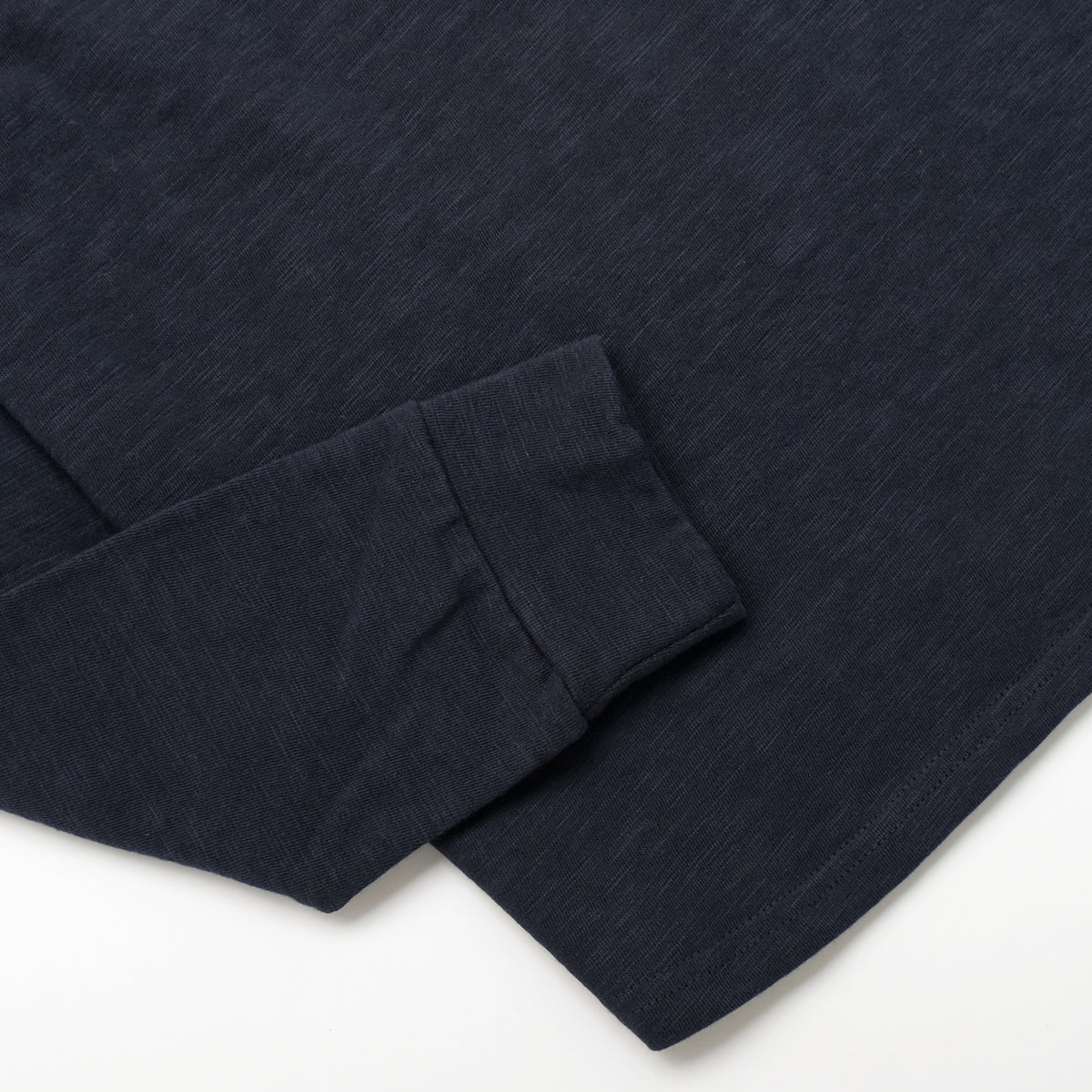 Navy henley long-sleeve shirt with ribbed sleeve cuffs