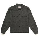 Wool camp shirt in dark charcoal with red flecks, button front and two chest pockets.