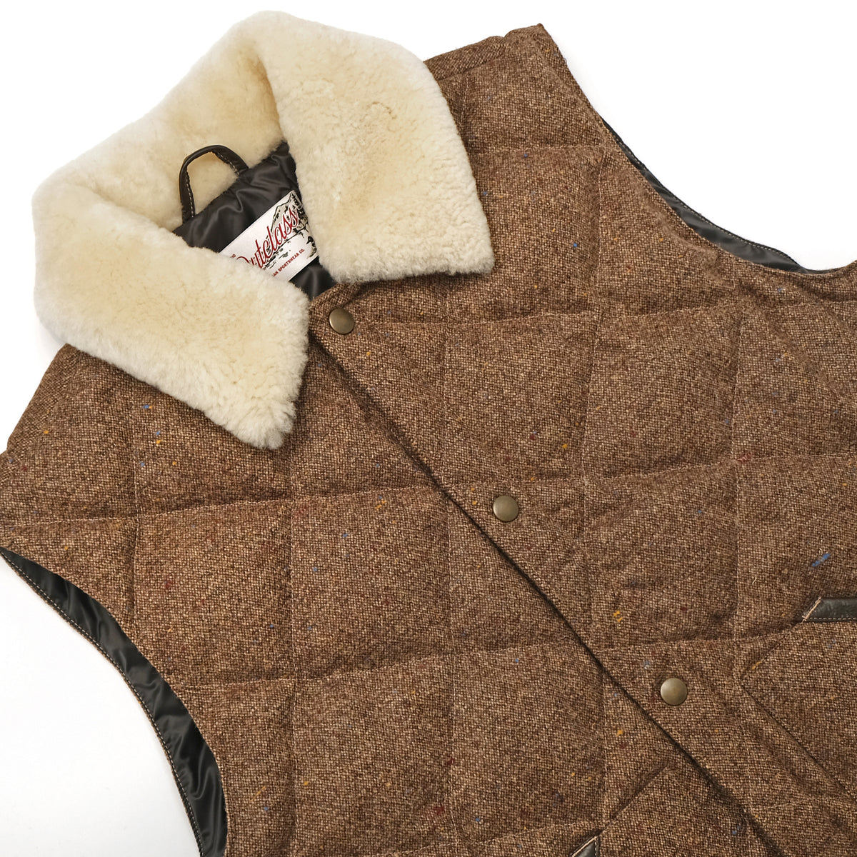 Brown quilted down vest with wide tan sherpa collar and angled button placket