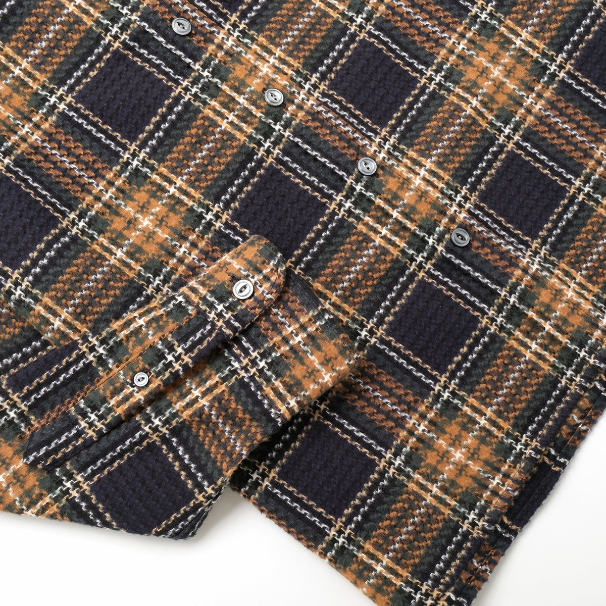 Tartan plaid easy shirt with buttoned placket and chest yoke, navy, tan, and orange