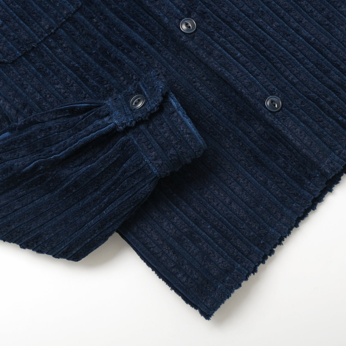 Navy jumbo corduroy club shirt sleeve and placket detail with buttons