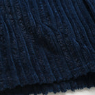 Navy jumbo corduroy fabric detail with dense vertical ribbed texture