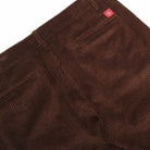 Dark brown corduroy camp pants, back yoke seam and small logo patch.