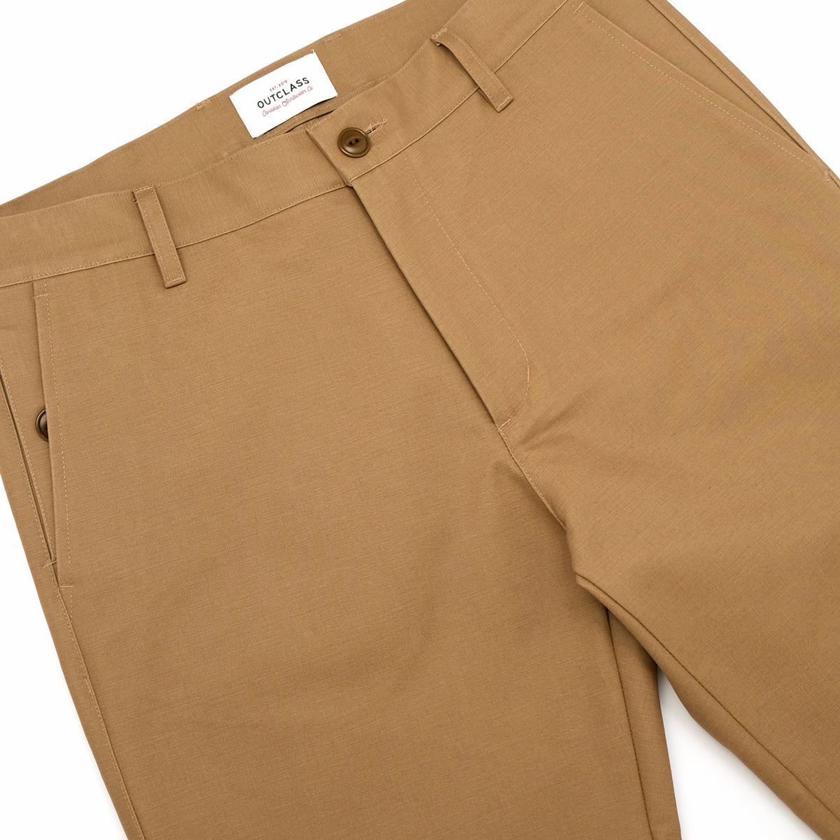 Tan moleskin engineer pants close-up of waistband, button fly, and belt loops