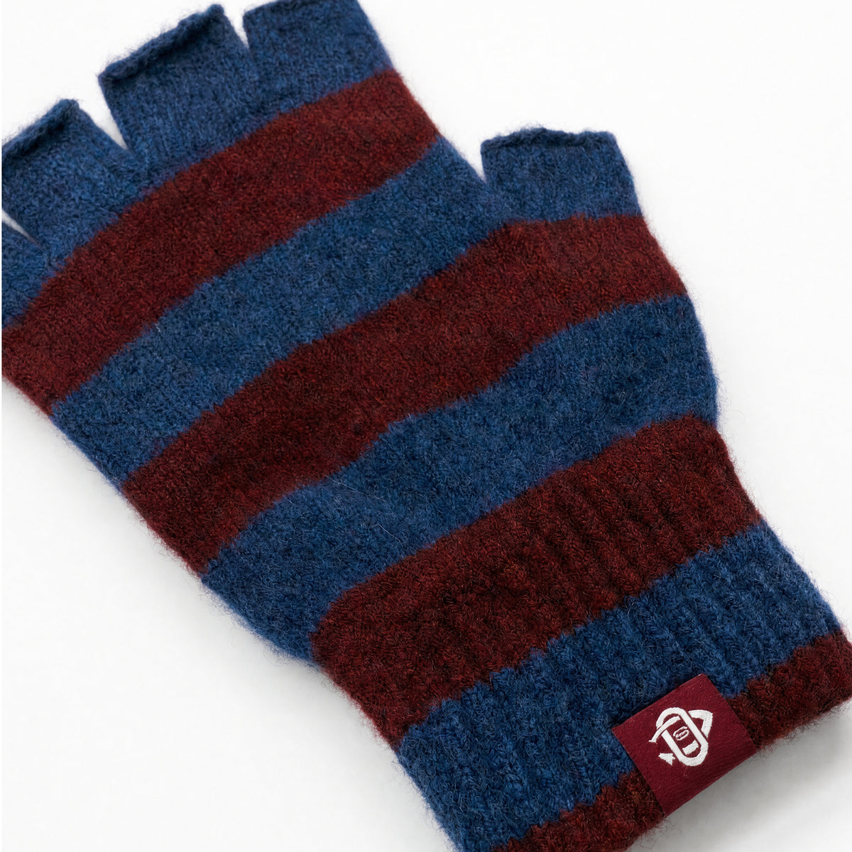 Striped wool fingerless glove close-up in blue and burgundy with ribbed trim