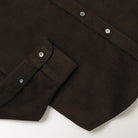 Baby corduroy shirt cuff and sleeve placket with small white button details