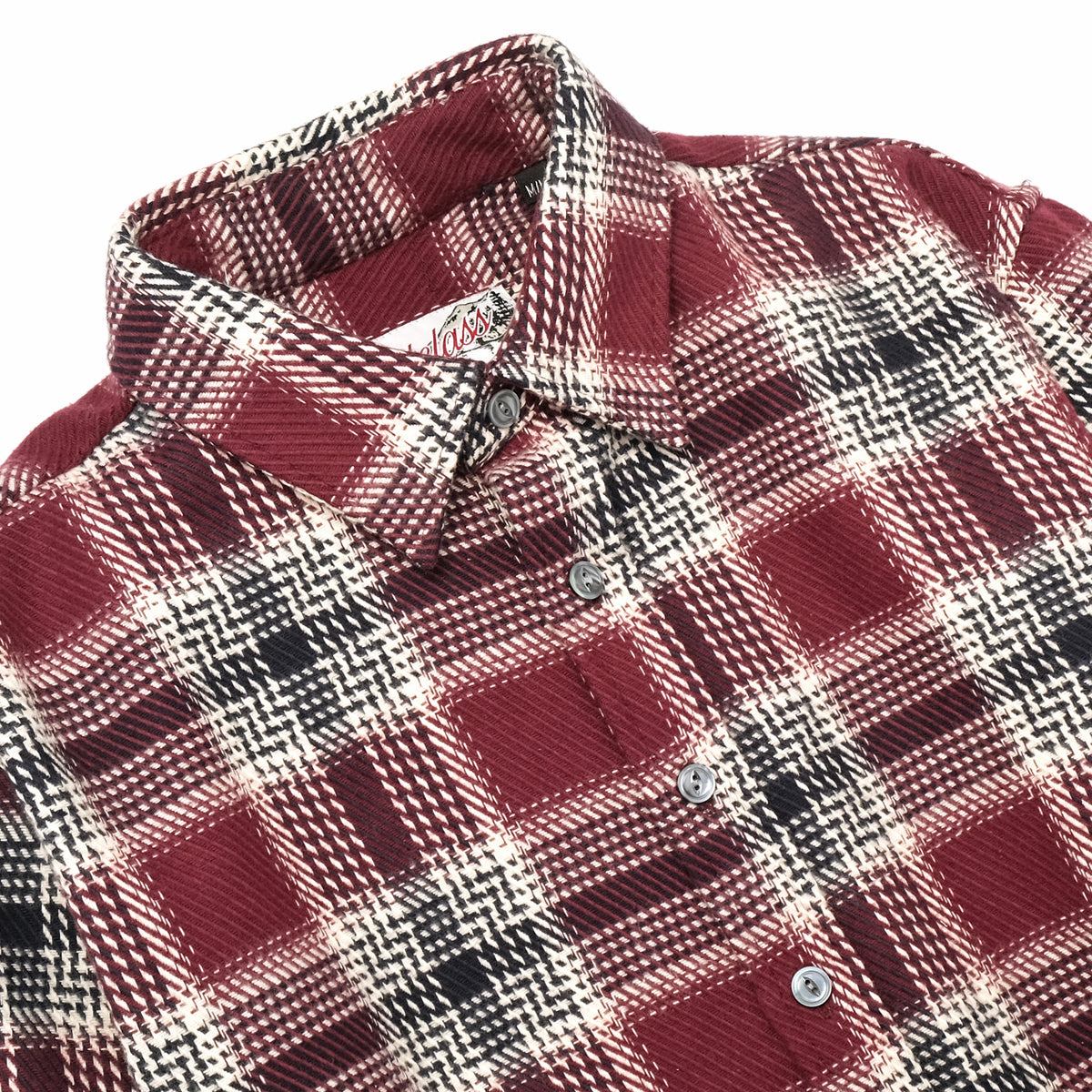 Maroon and cream plaid button-up shirt with folded collar and metal buttons
