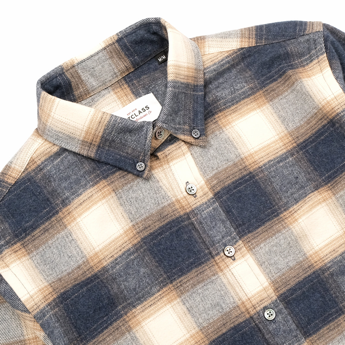 Blue and cream plaid flannel shirt, button placket and folded collar detail