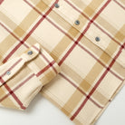 Ecru plaid easy shirt details: chest buttons and buttoned cuffs