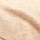 Ecru tweed flannel fabric close-up with fine textured weave