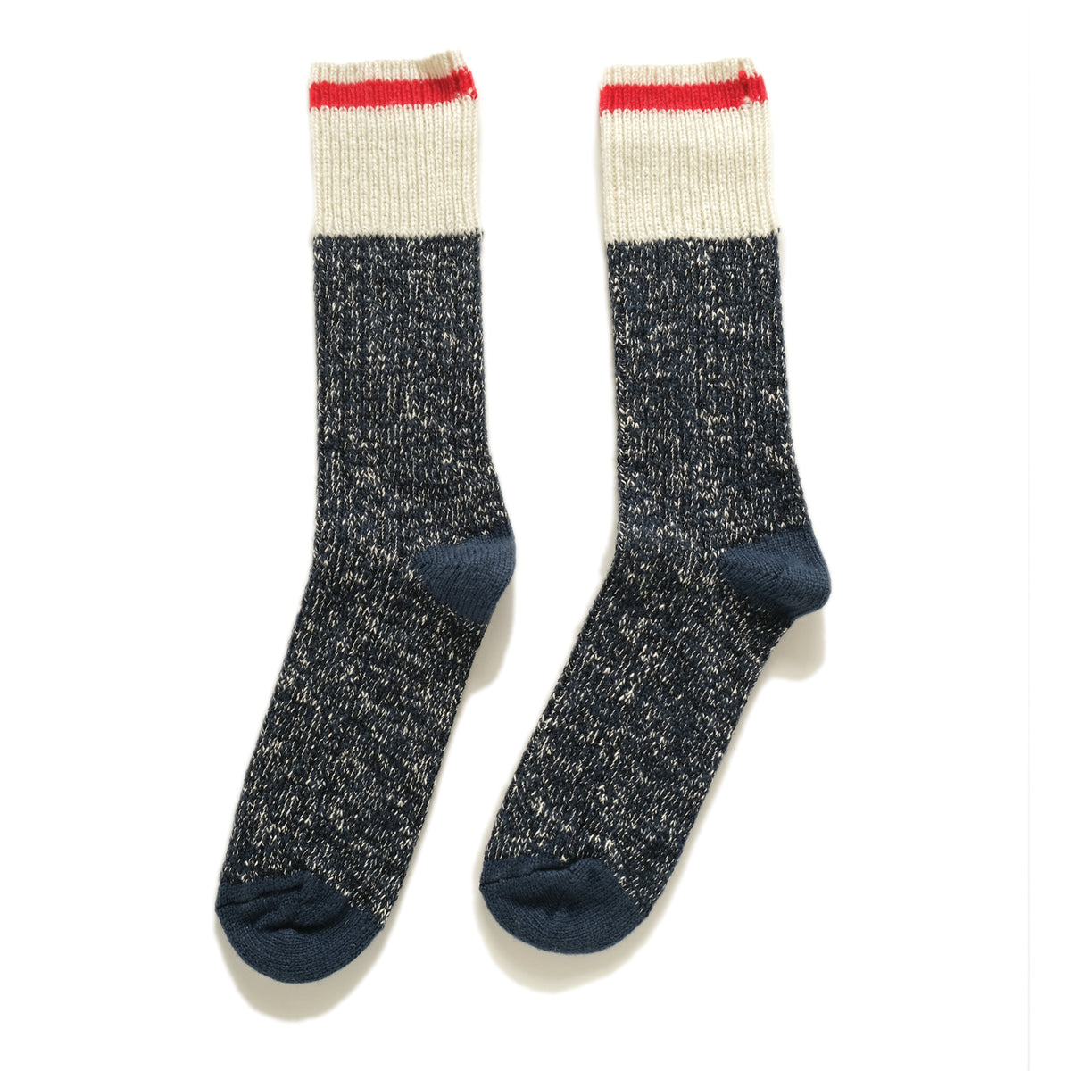 Marled wool camping socks with cream ribbed cuff and red toe/heel accents, dark blue.