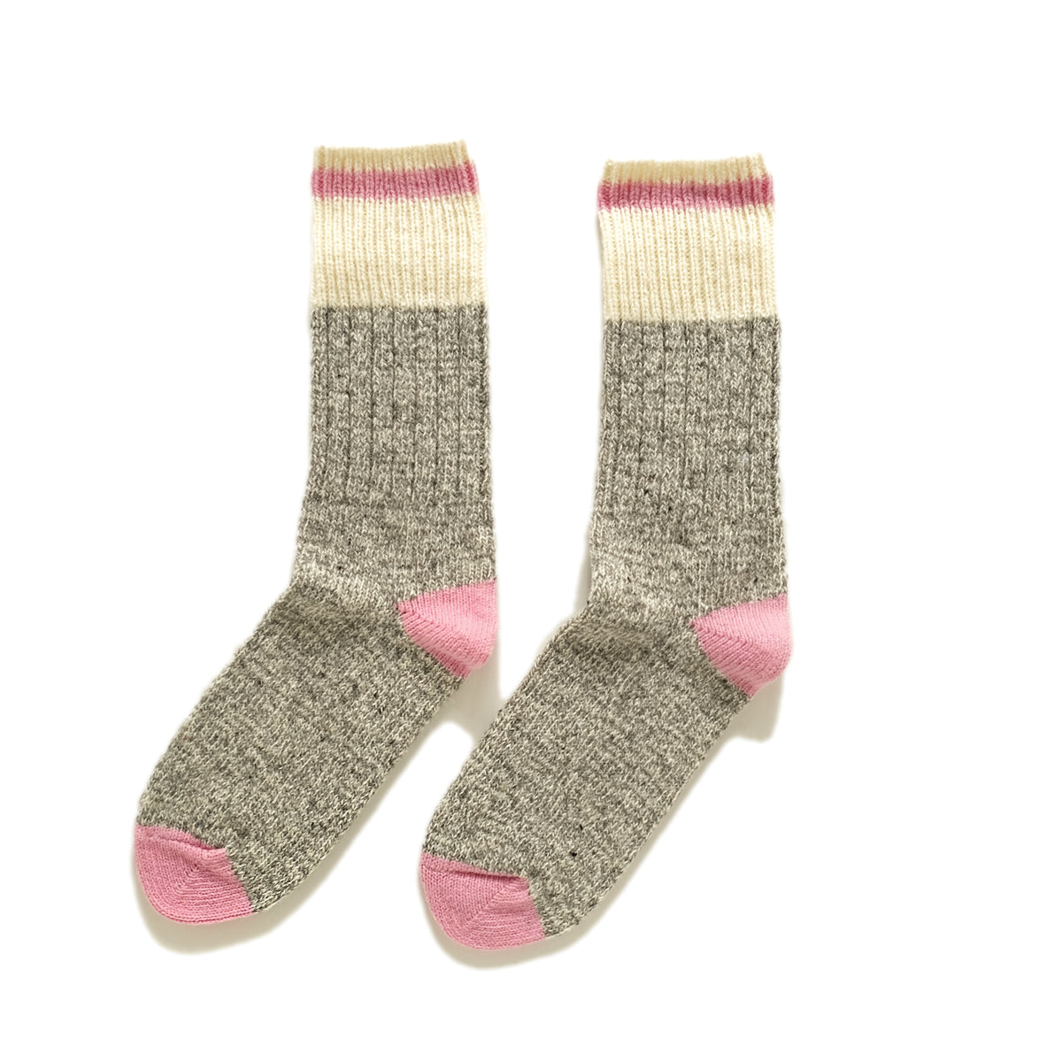 Pink and gray wool camping socks with cream ribbed cuffs and pink toe/heel