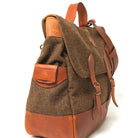 Wool messenger bag side view with flap pocket and adjustable leather strap