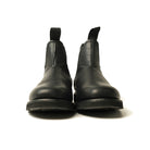 Black Chelsea boot pair from front, ankle height with elastic side panels