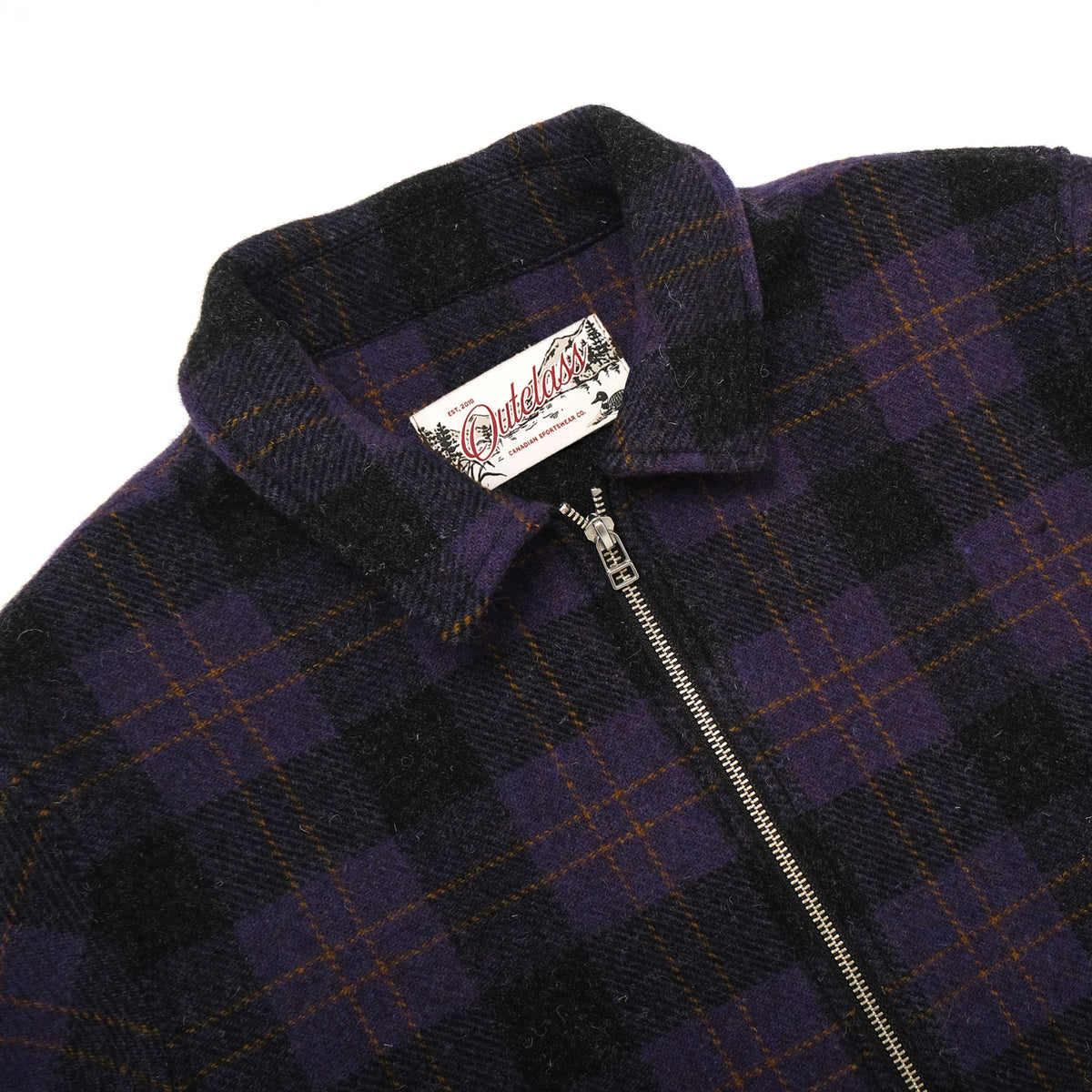 Plaid wool overshirt with zip-front and brand label at the collar