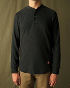 Black slub long-sleeve henley shirt, henley button placket and long sleeves