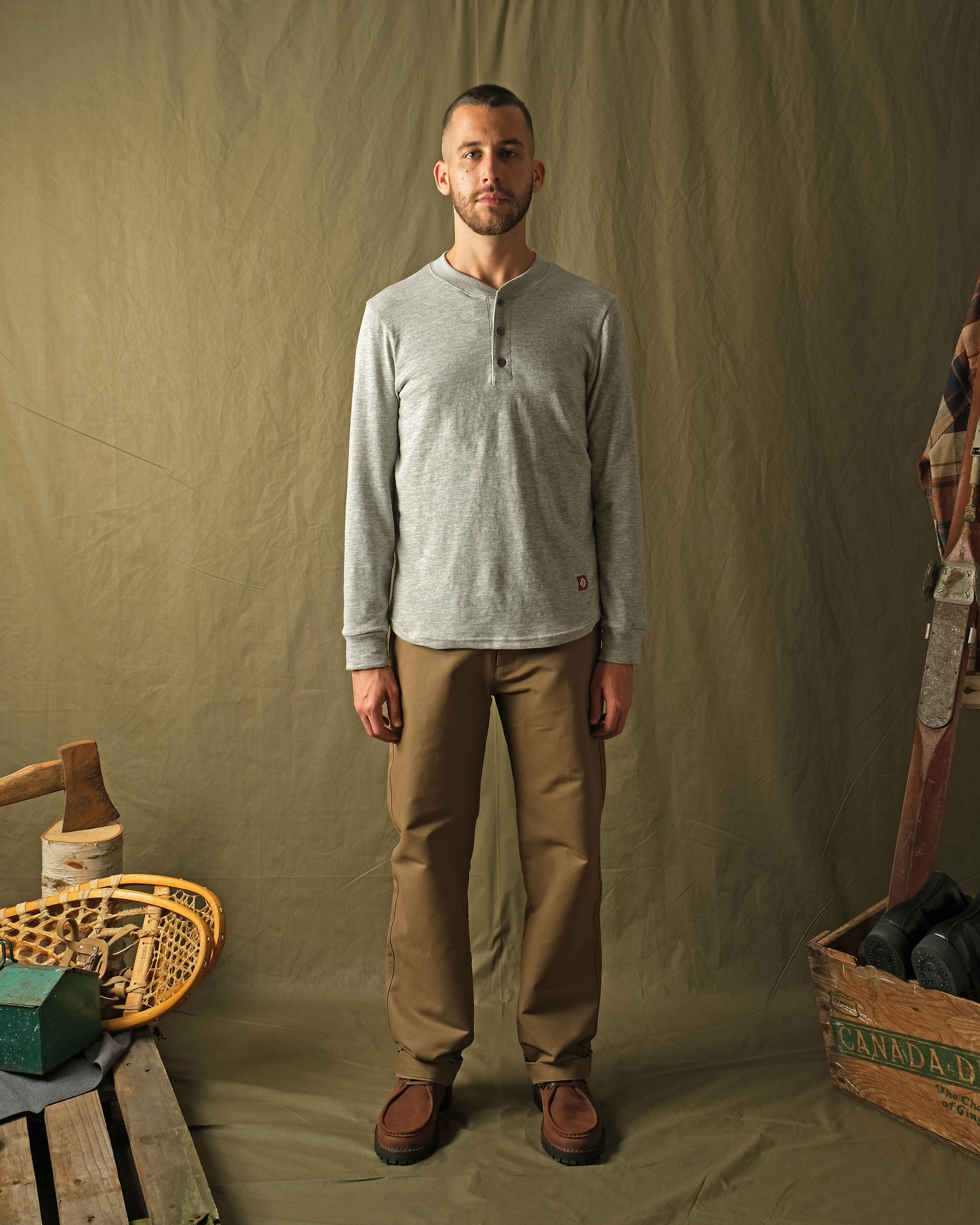 Heather grey slub long-sleeve henley shirt with button placket and relaxed fit