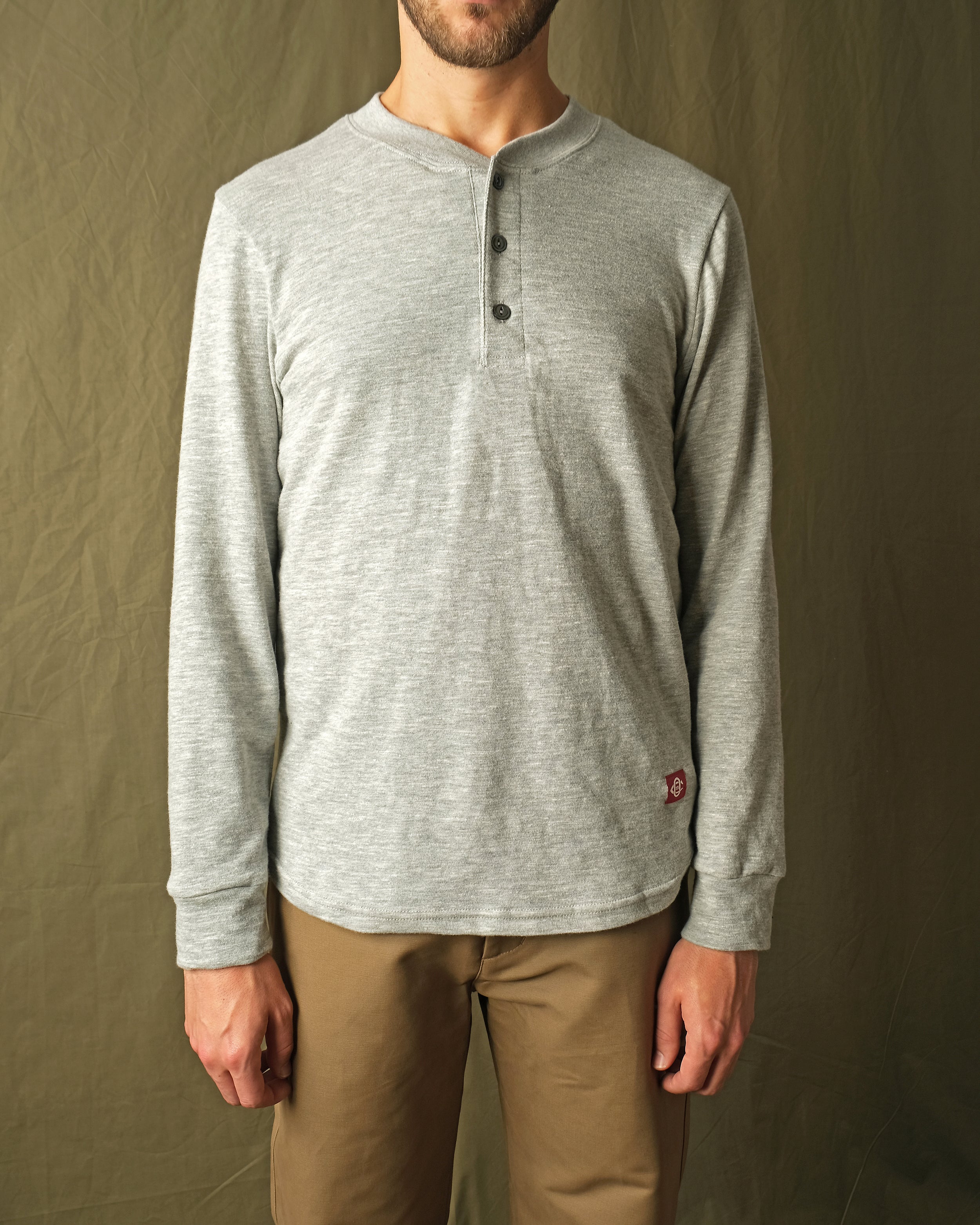 Heather grey slub long-sleeve henley with button placket and straight hem