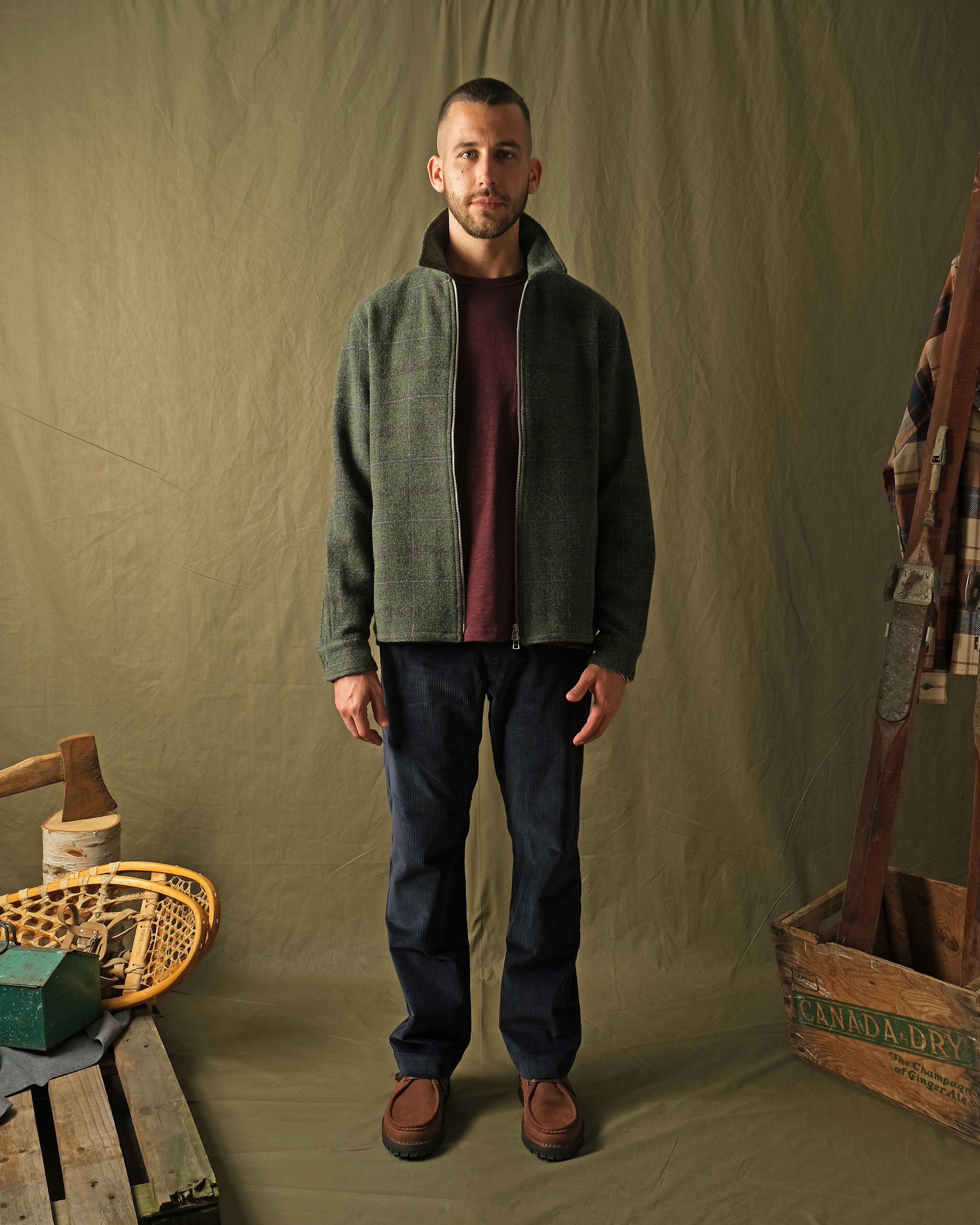 Olive green plaid wool zip overshirt with stand collar and front pockets