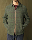 Olive green plaid wool zip overshirt, front view with stand collar and zipper