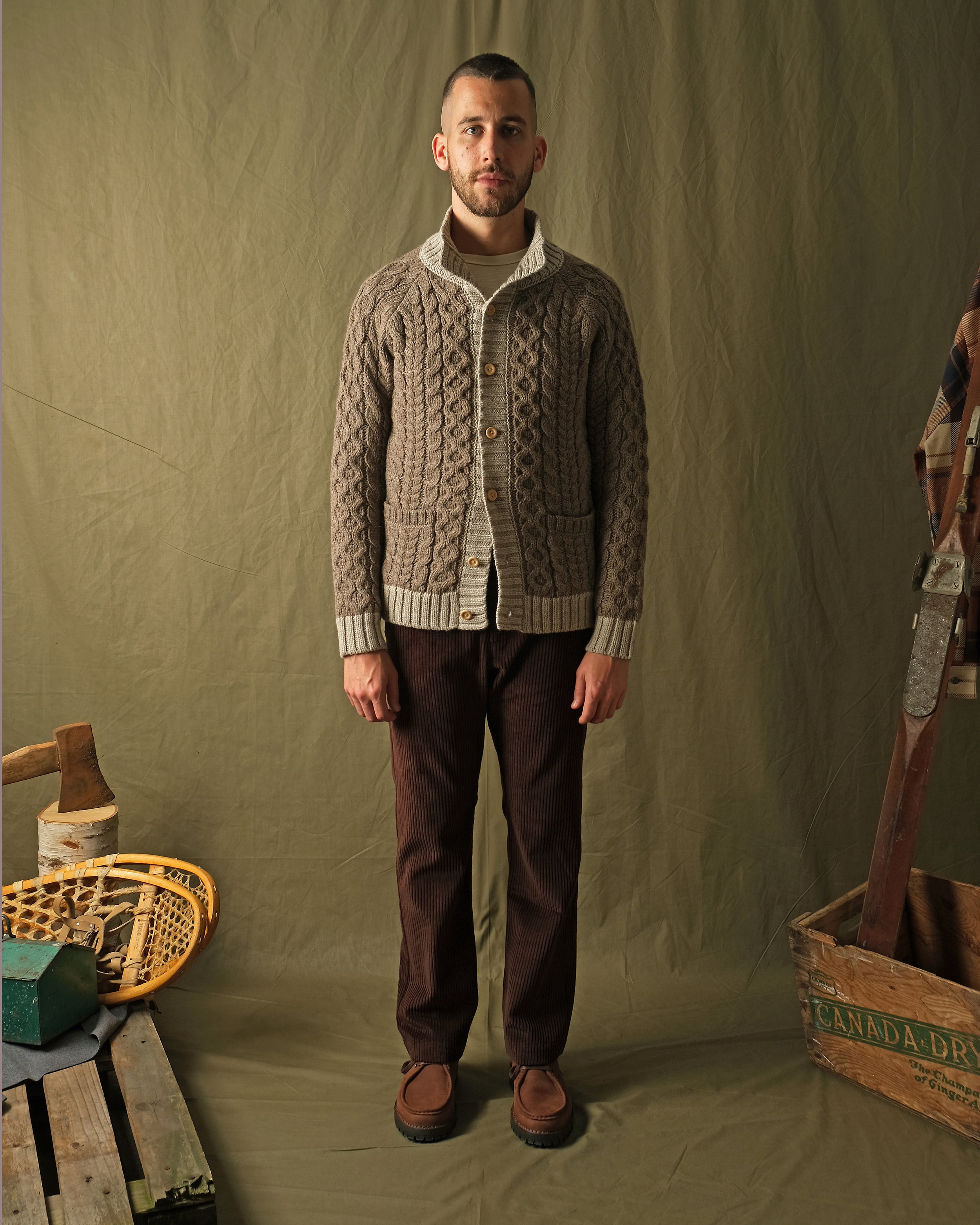 Taupe cable knit cardigan with cream mock neck, button-front, and ribbed cuffs