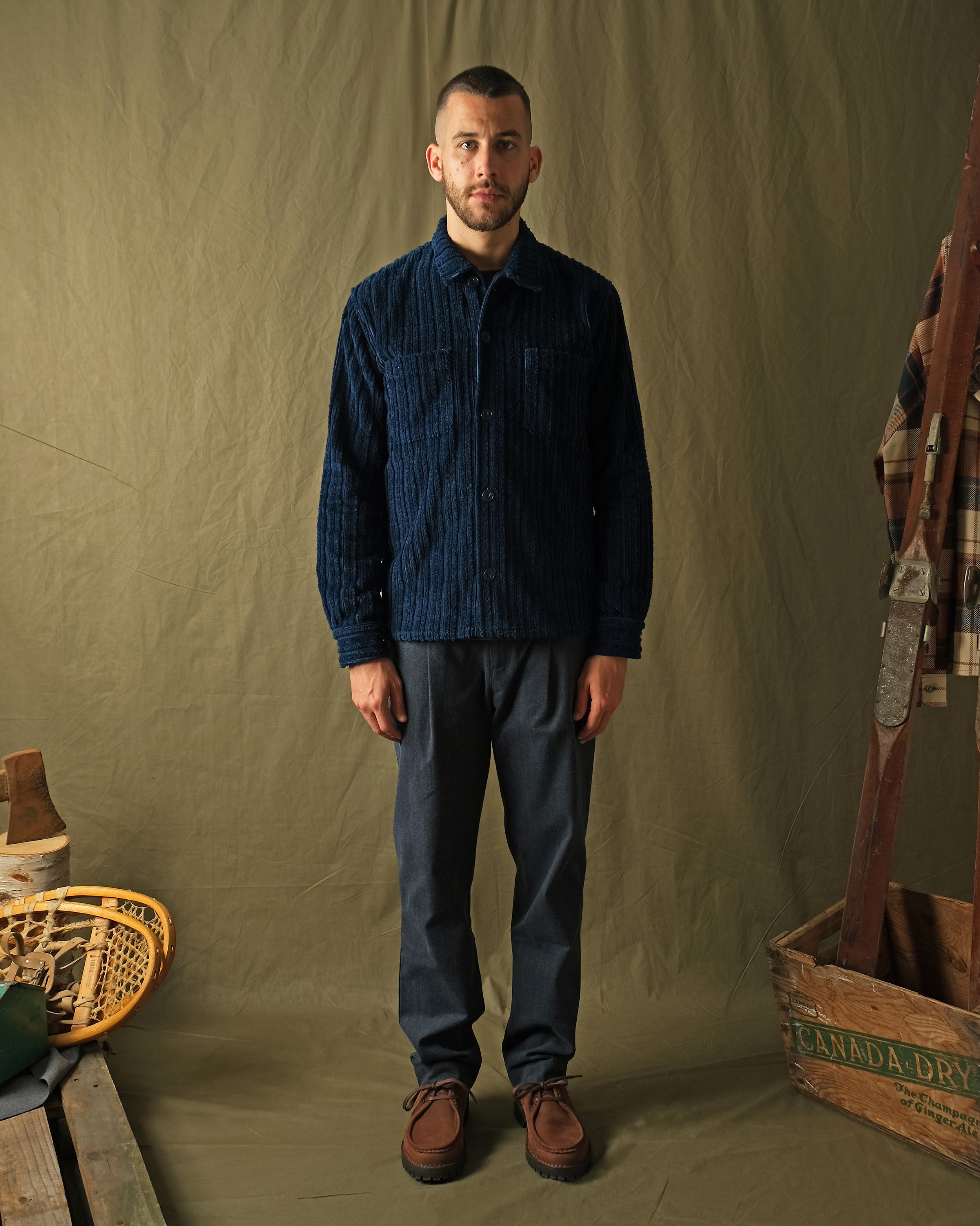 Dark navy corduroy club shirt with button front and two chest pockets