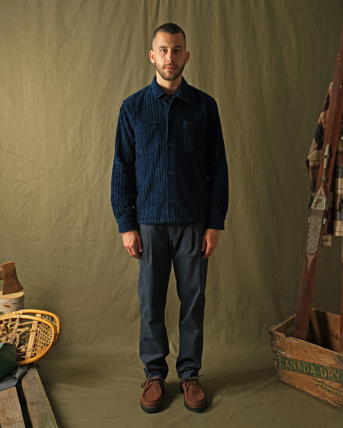 Dark navy corduroy club shirt with button front and two chest pockets