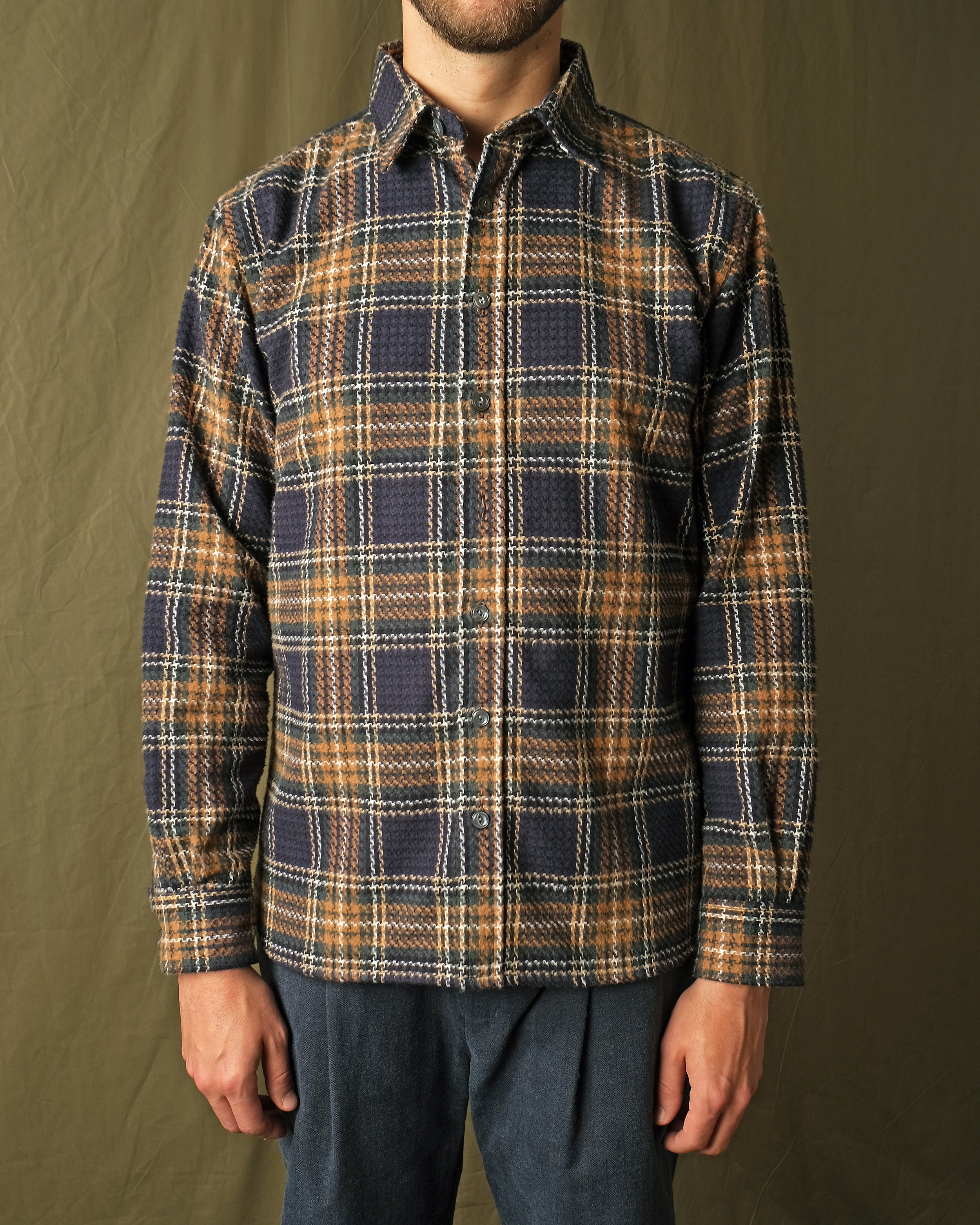 Tartan plaid flannel button-up shirt with long sleeves, dark navy and orange check