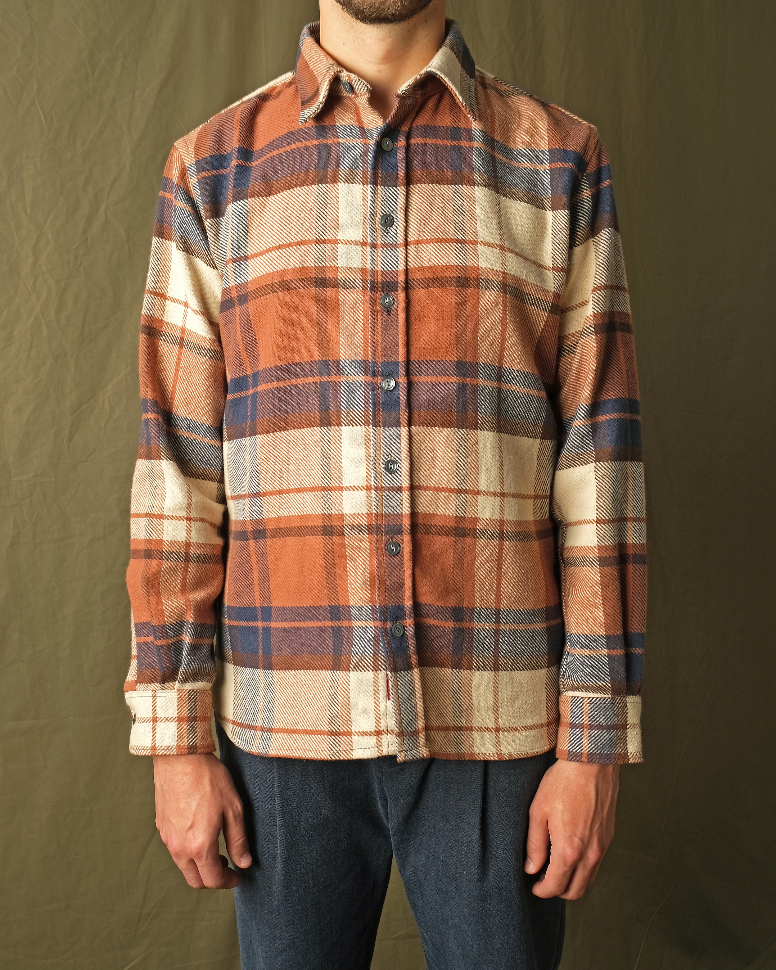 Men's plaid flannel easy shirt with button front and chest pocket, orange and navy