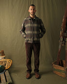 Plaid wool harrington jacket on model, front view with side pockets and zipper