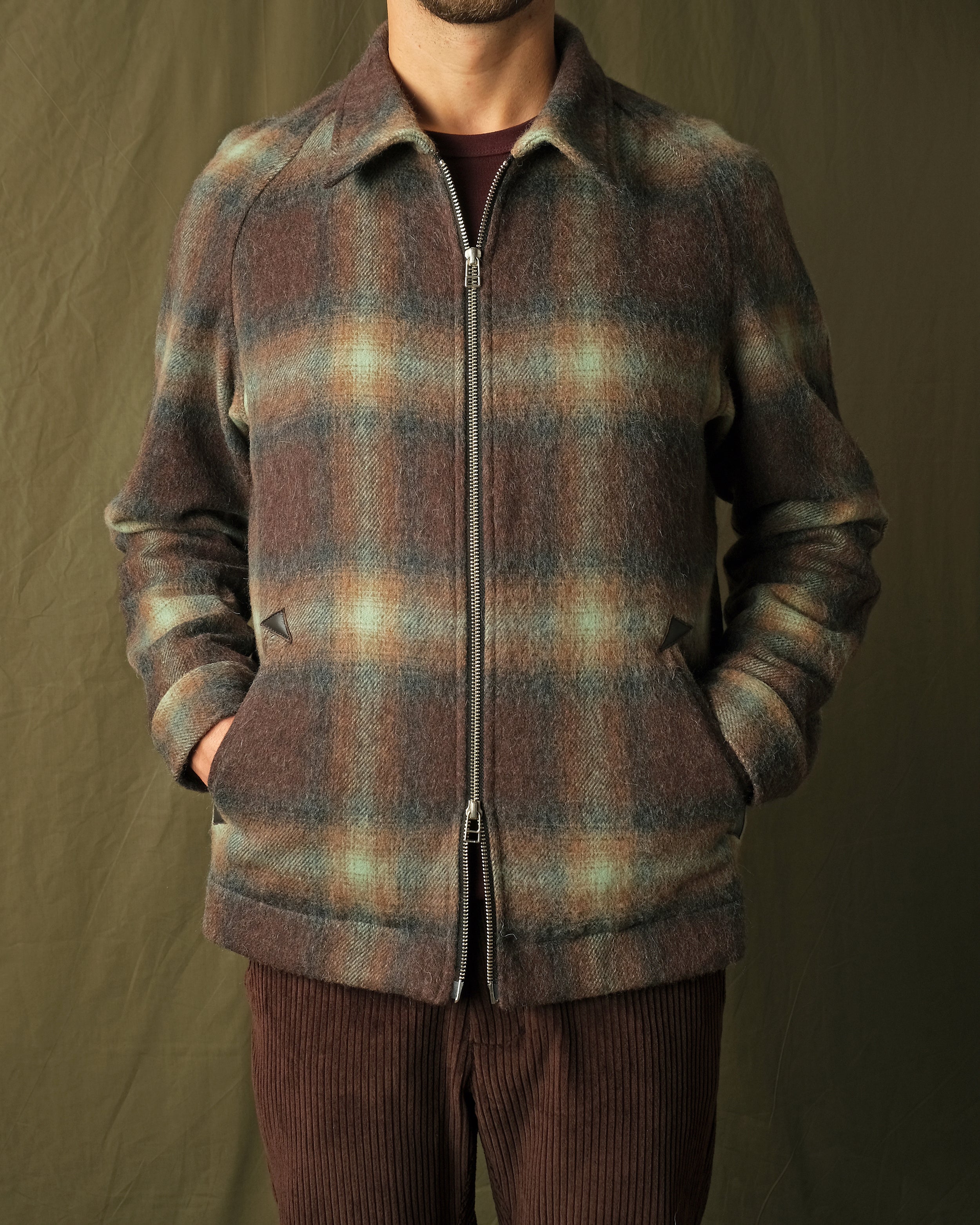 Front view of plaid wool harrington jacket with full zipper and side pockets