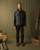 Wool camp shirt in dark charcoal speckled flecks, long sleeves, button front.