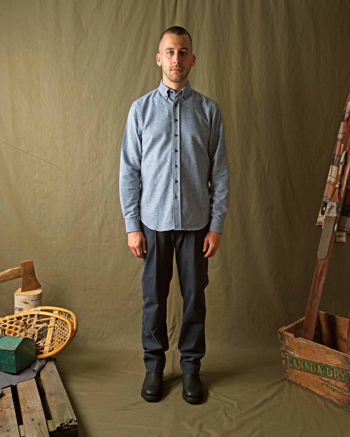 Blue fleck flannel classic button-up shirt with long sleeves and button-front closure