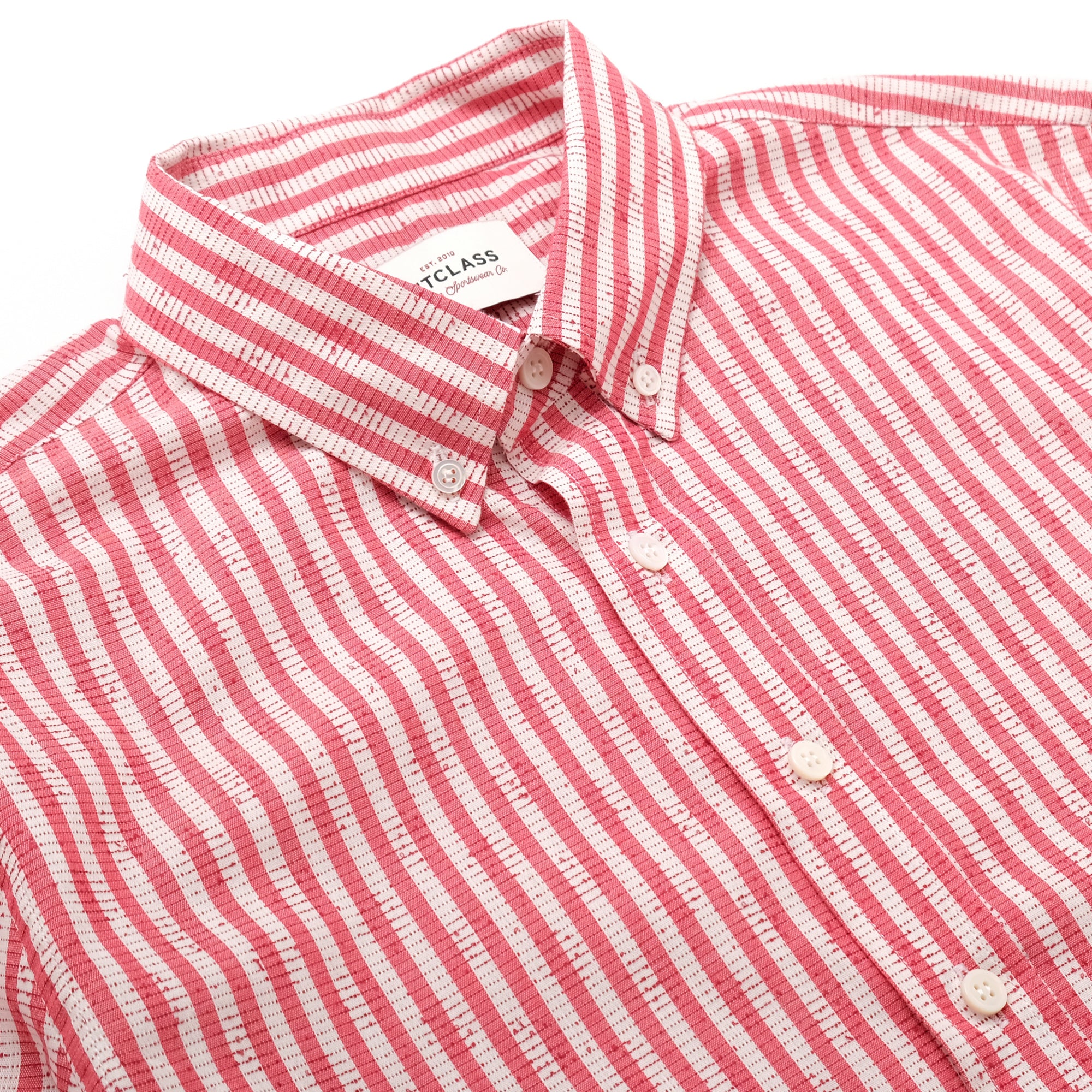 Classic shirt collar with red-and-white stripes and buttoned neckline
