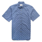 Light blue short-sleeve button-up shirt with navy palm print and classic collar